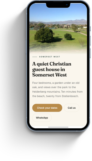 Milas Place guest house page on a phone
